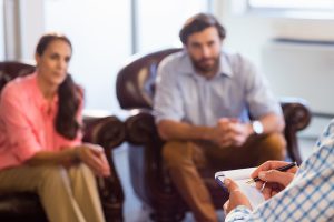 Couple undergoing marriage counseling.